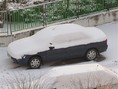 Zasnežené auto
