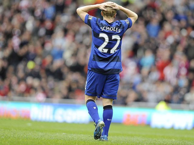 Smútok hráča Manchestru United Paula Scholesa.