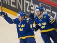 Henrik Sedin (vľavo) s bratom Danielom