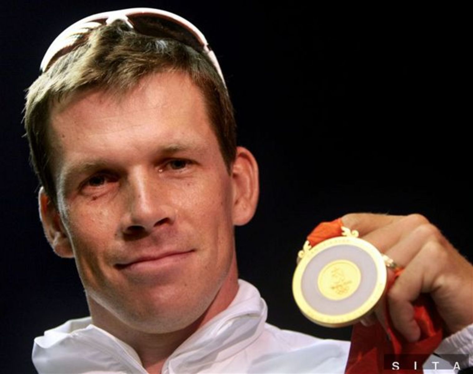 Michal Martikán so zlatou medailou.