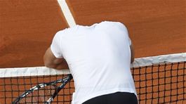 Sklamaný Andy Roddick.