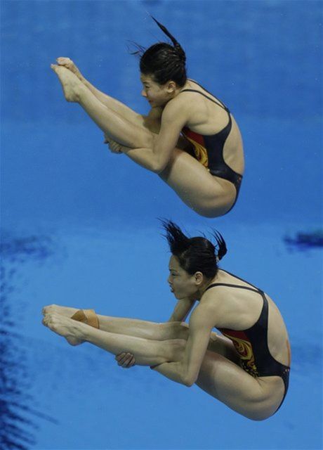 Čínske skokanky do vody Wu Min-sia (dolu), Che...