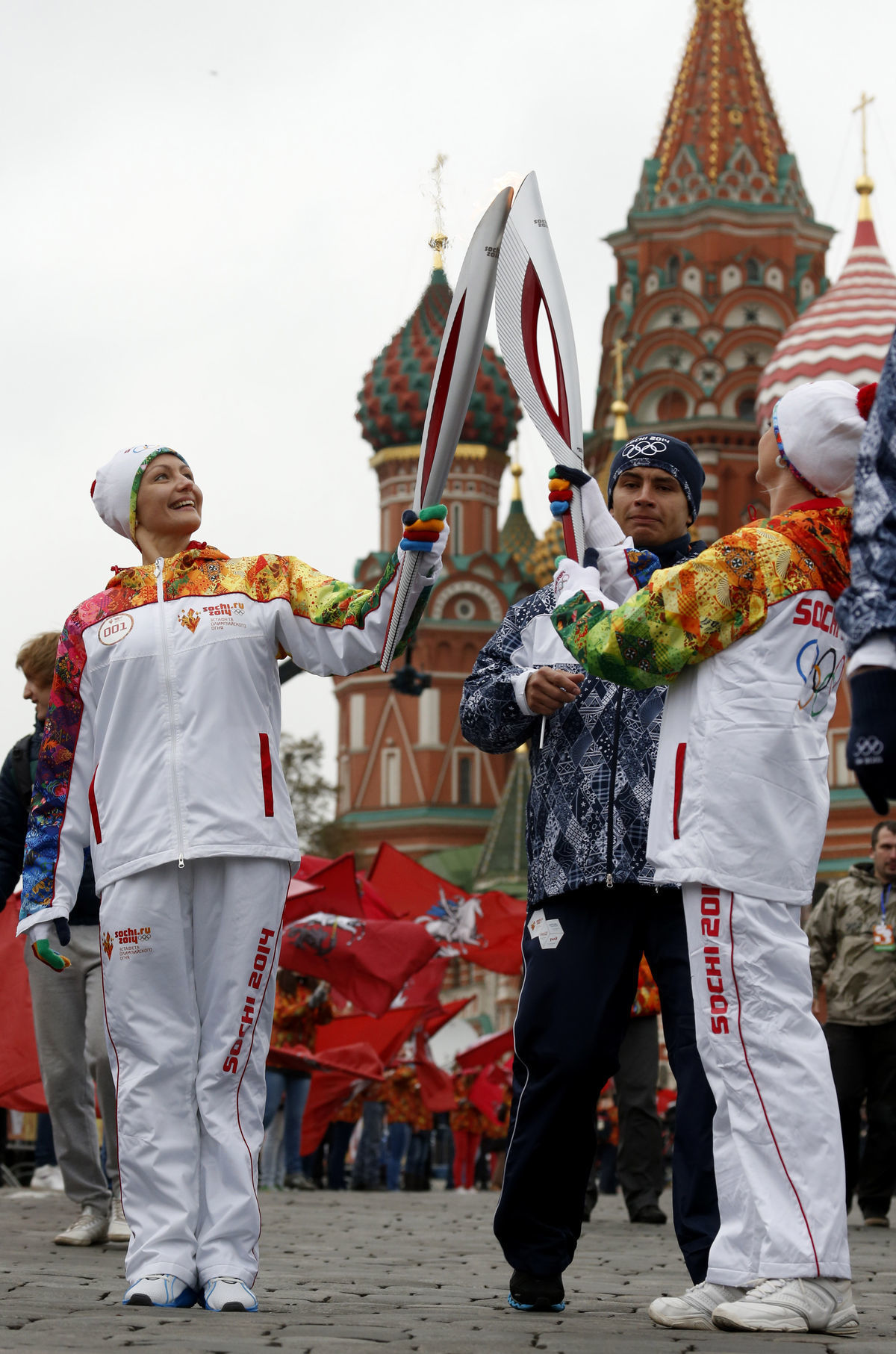 Olympijská pochodeň v Moskve.