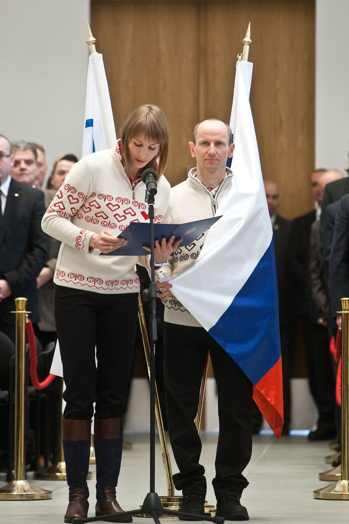 Biatlonistka Anastasia Kuzminová a bežec na...