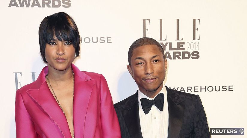 Spevák Pharrell Williams a jeho manželka Helen...