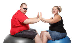 Kilá navyše má takmer tretina z nás