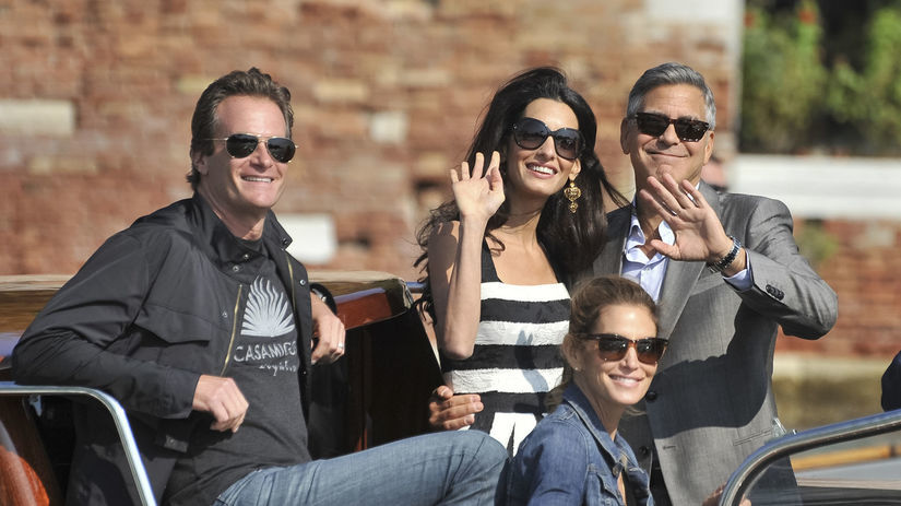 Italy Clooney George Clooney (vpravo) v objatí...