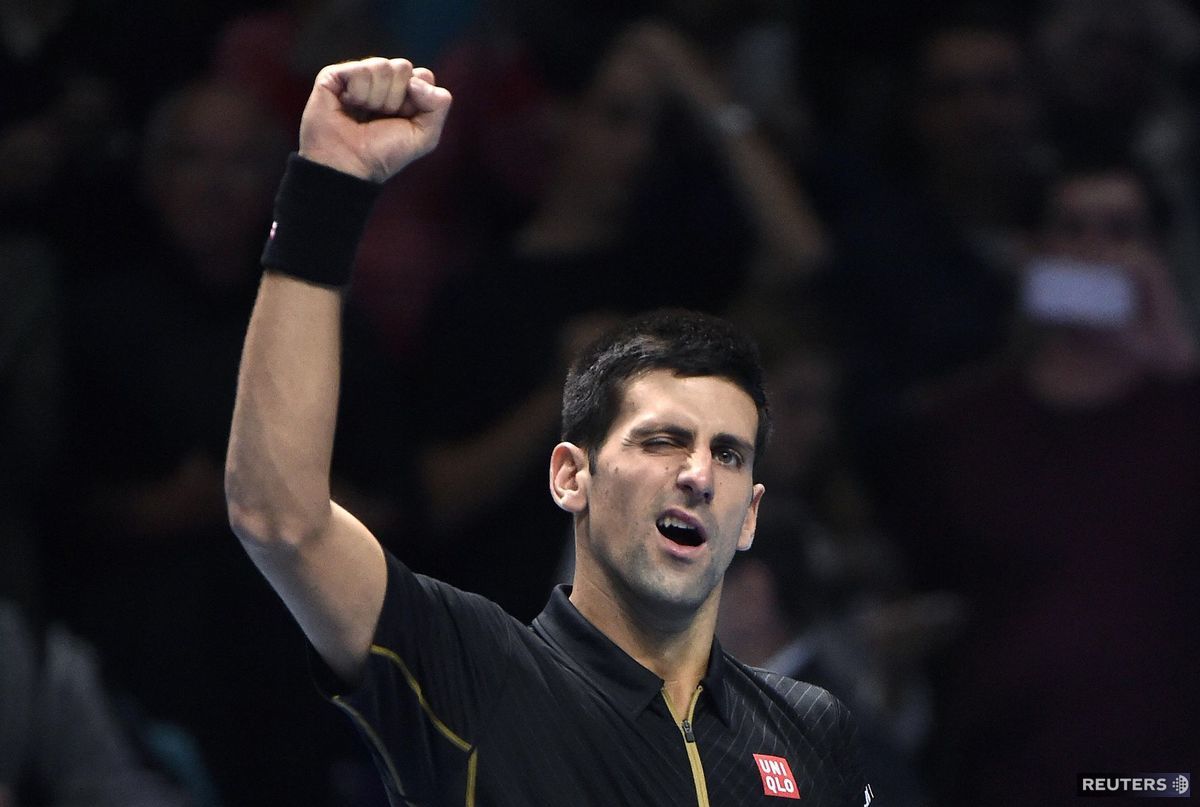 Novak Djokovič sa teší z vítazstva nad Keiom...