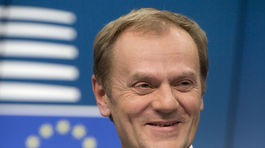 Tusk za postoj k utečeneckej kríze čelí v Nemecku kritike
