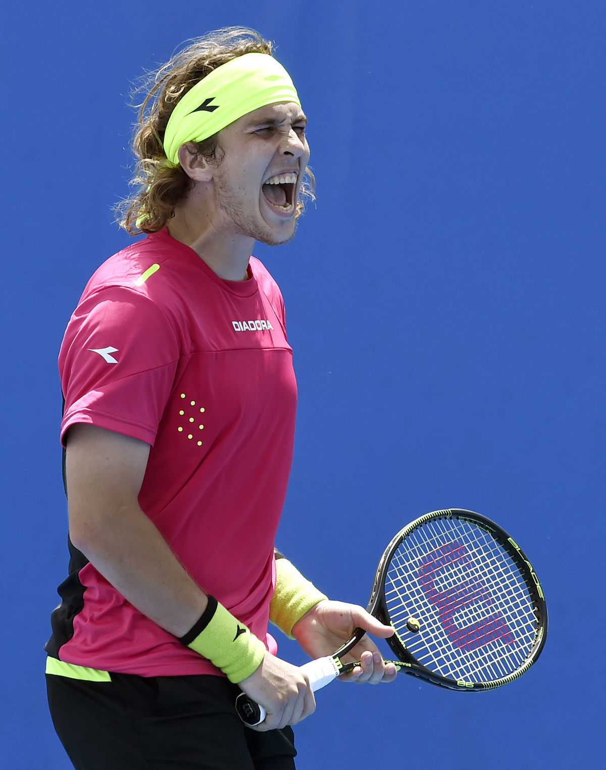 Lukáš Lacko počas I. kola Australian Open 2015.