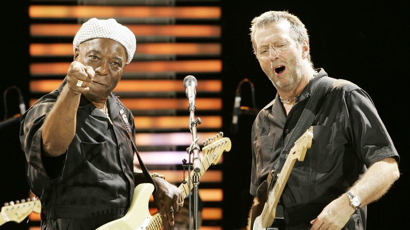 Eric Clapton a bluesová gitarová legenda Buddy...