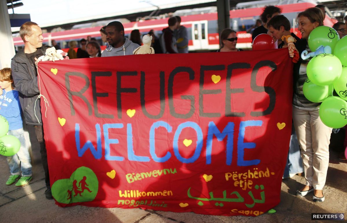 Migranti, vitajte! S týmito transparentmi...