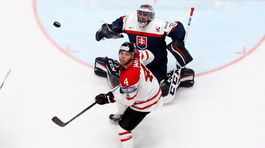 Taylor Hall, Július Hudáček