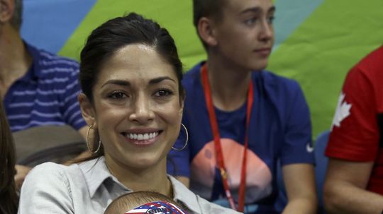 Nicole Johnson drží synčeka Boomera na...