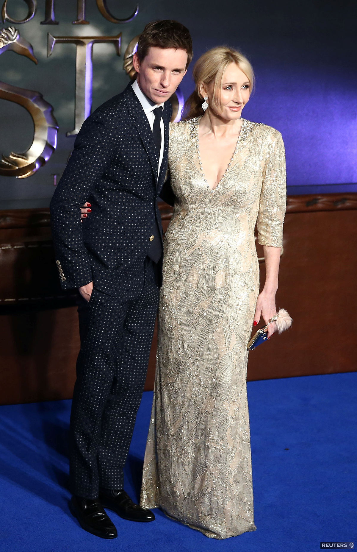 Eddie Redmayne a spisovateľka  J.K. Rowling...