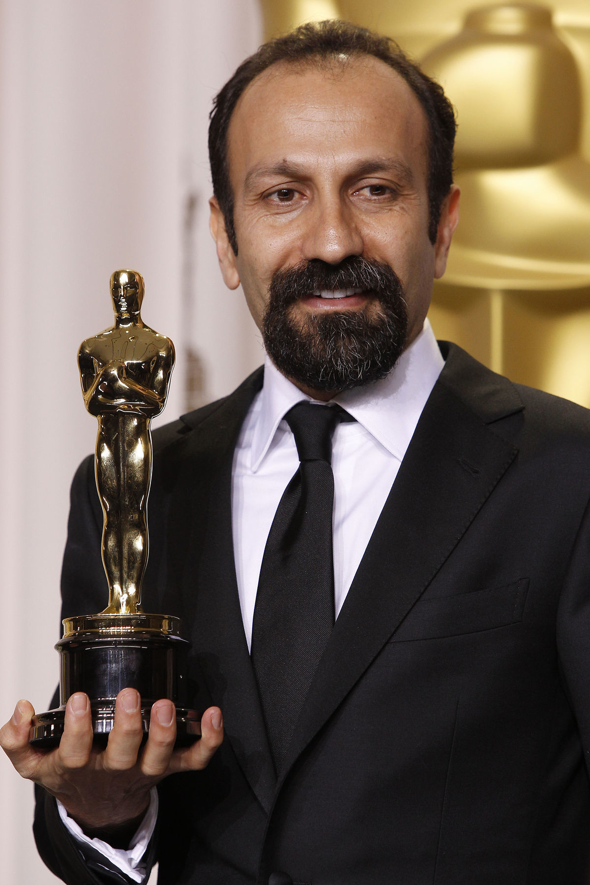 Režisér Asghar Farhádí s Oscarom za film...