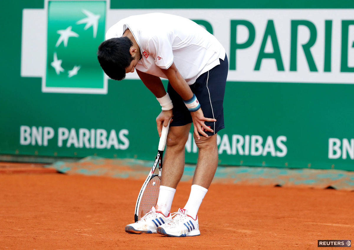 Novak Djokovič v zápase proti Belgičanovi...