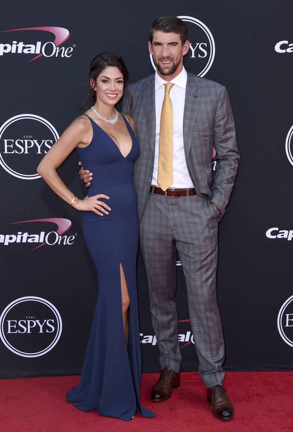 Plavec Michael Phelps s manželkou Nicole Johnson.