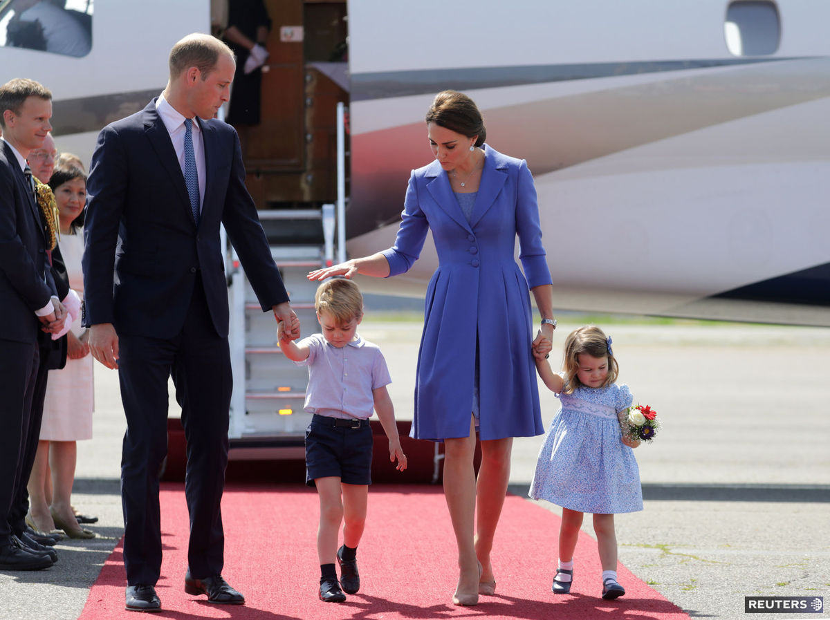 Princ William a jeho manželka Catherine,...