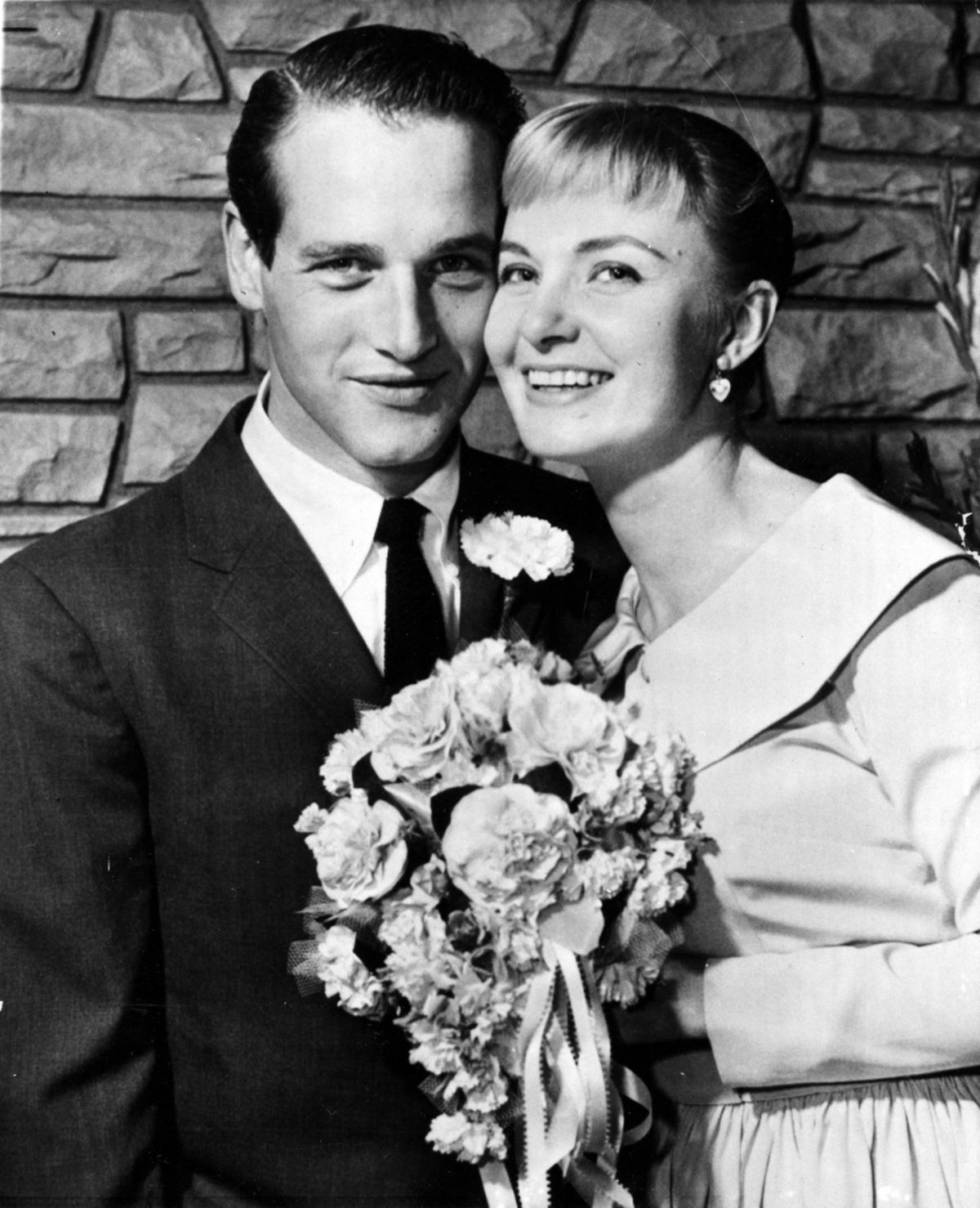 Joanne Woodward a Paul Newman počas ich svadby...
