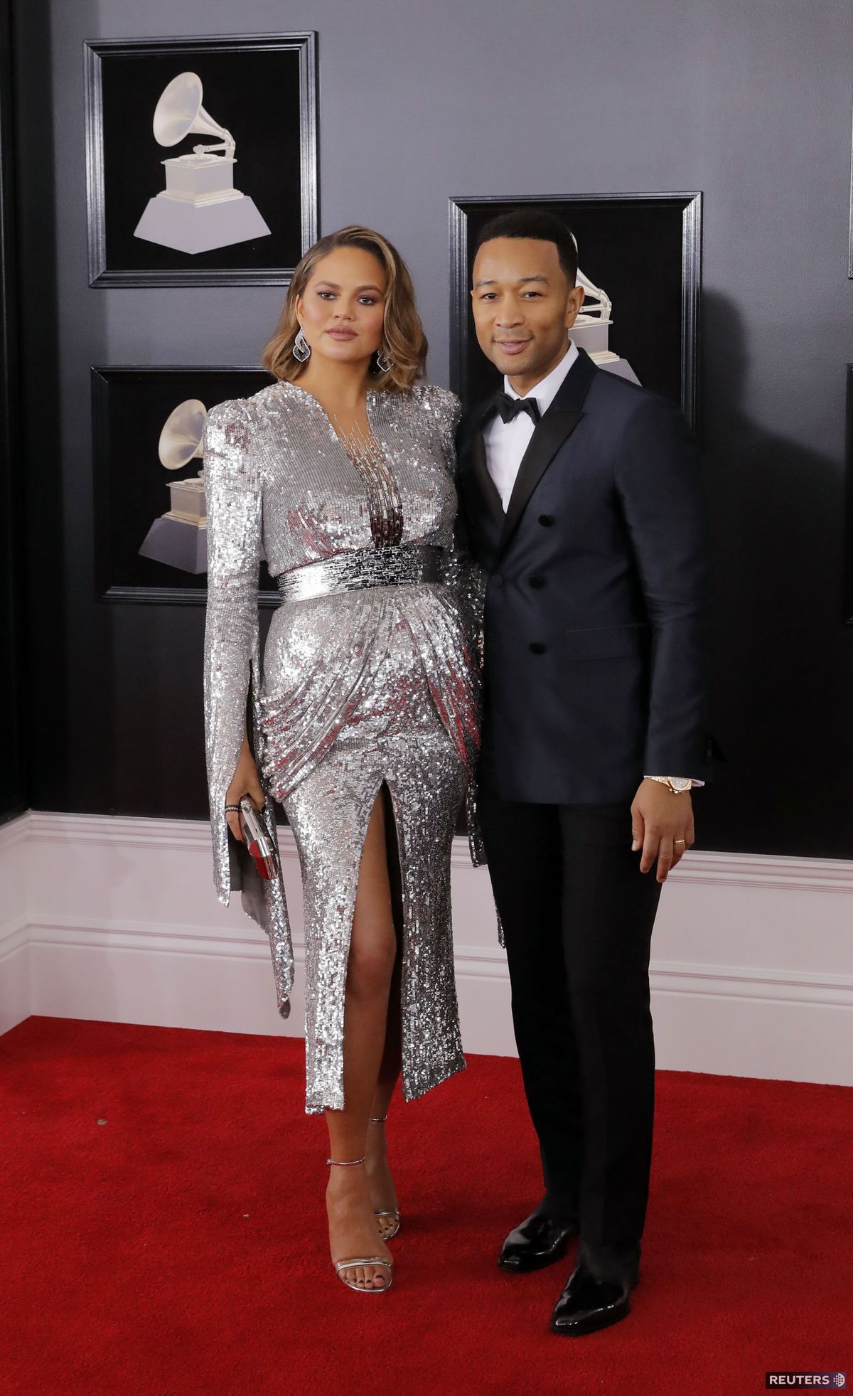 Topmodelka Chrissy Teigen a jej manžel John...