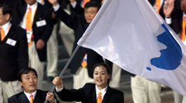 Japonsko protestuje proti spoločnej kórejskej vlajke. Problémom je malá bodka