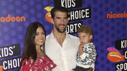 Plavec Michael Phelps, jeho partnerka Nicole...