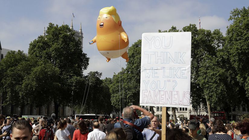 Britain Trump Protest Signs