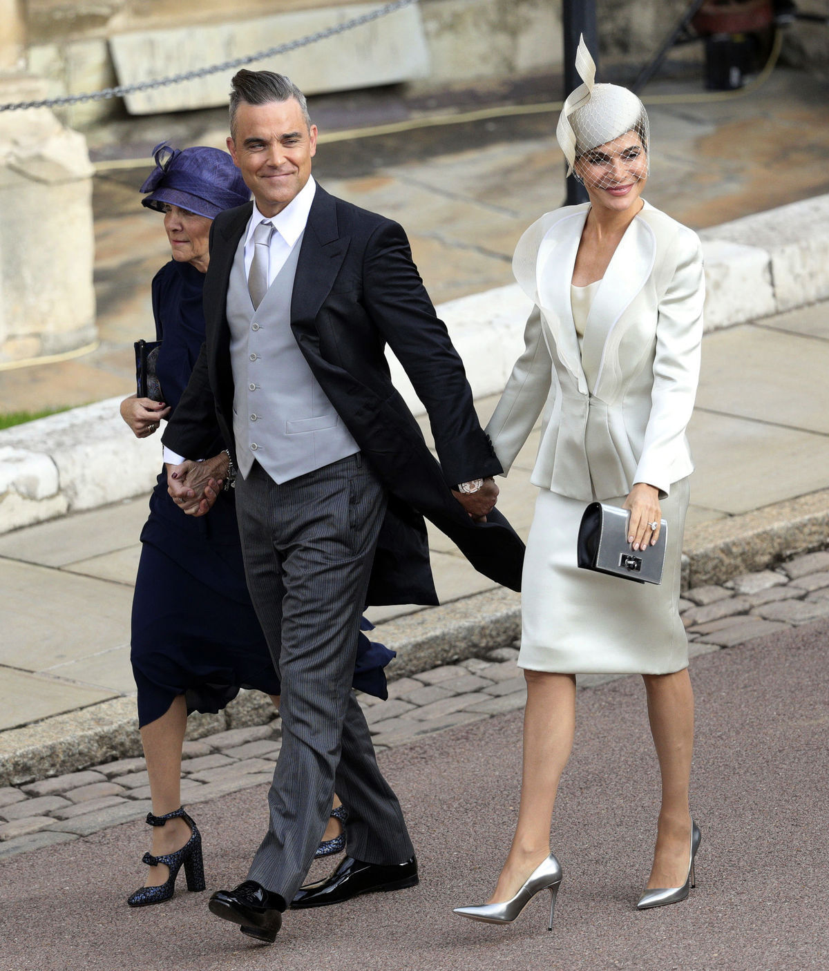 Robbie Williams, jeho manželka Ayda Field a...