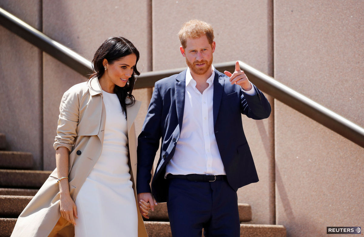 Princ Harry a jeho manželka Meghan počas...