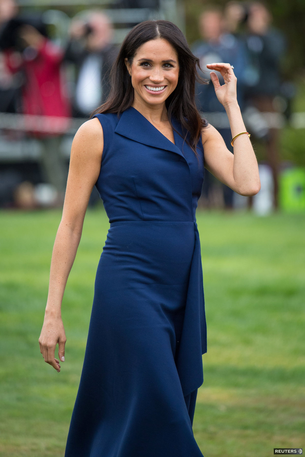 Meghan počas návštevy Melbourne a šatách...