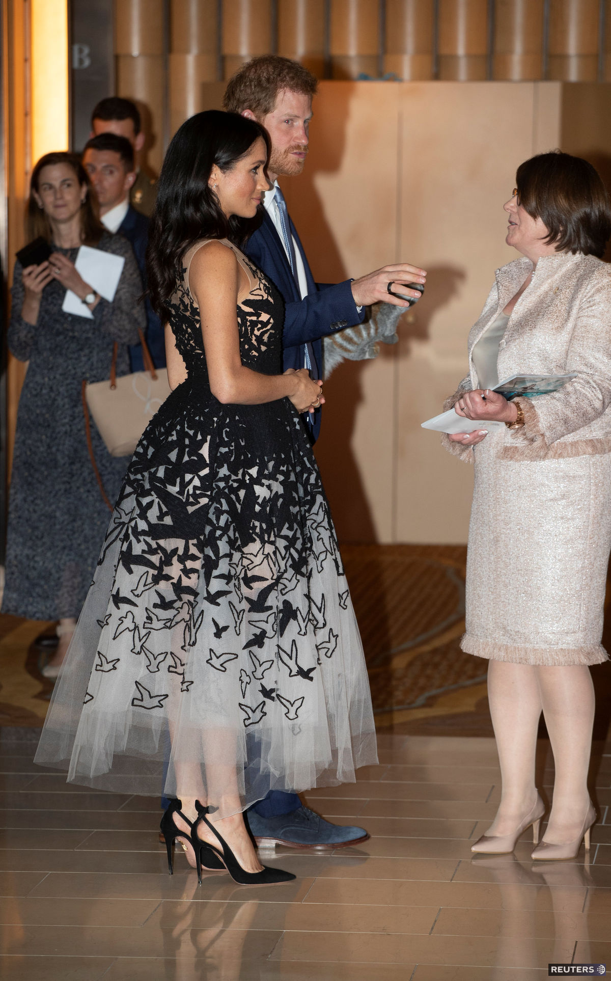 Vojvodkyňa Meghan v šatách Oscar de la Renta...