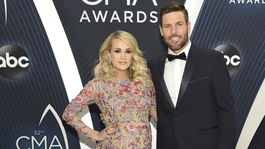 Tehotná speváčka Carrie Underwood a jej manžel Mike Fisher.