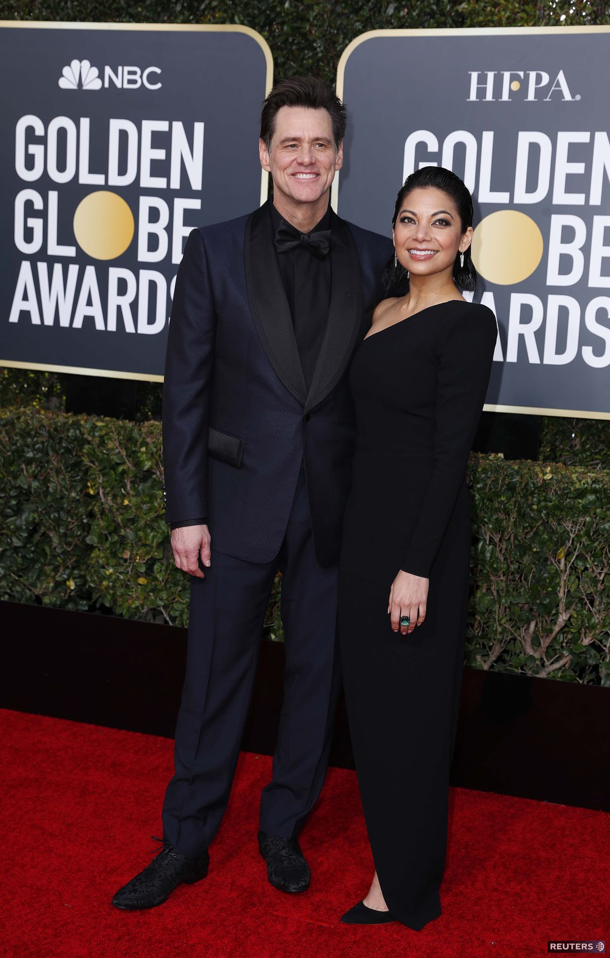 Herec Jim Carrey a jeho partnerka Ginger Gonzaga.