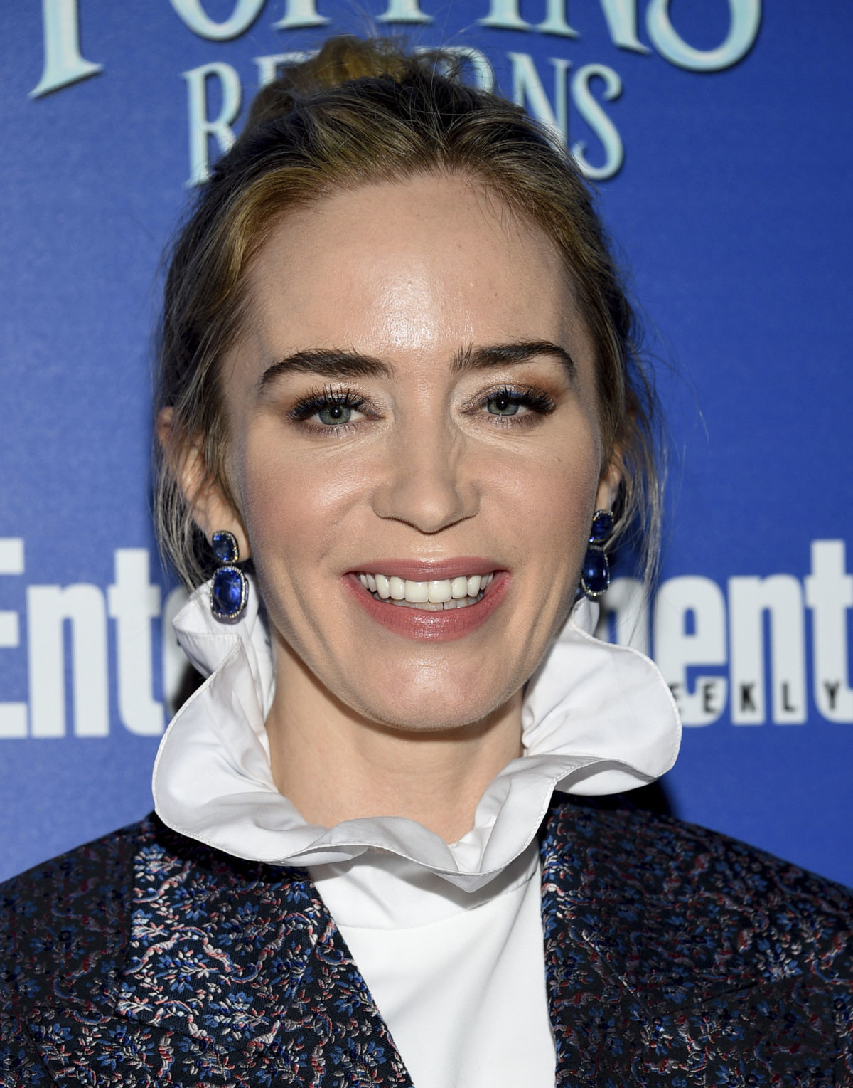 Herečka Emily Blunt pózuje fotografom počas...