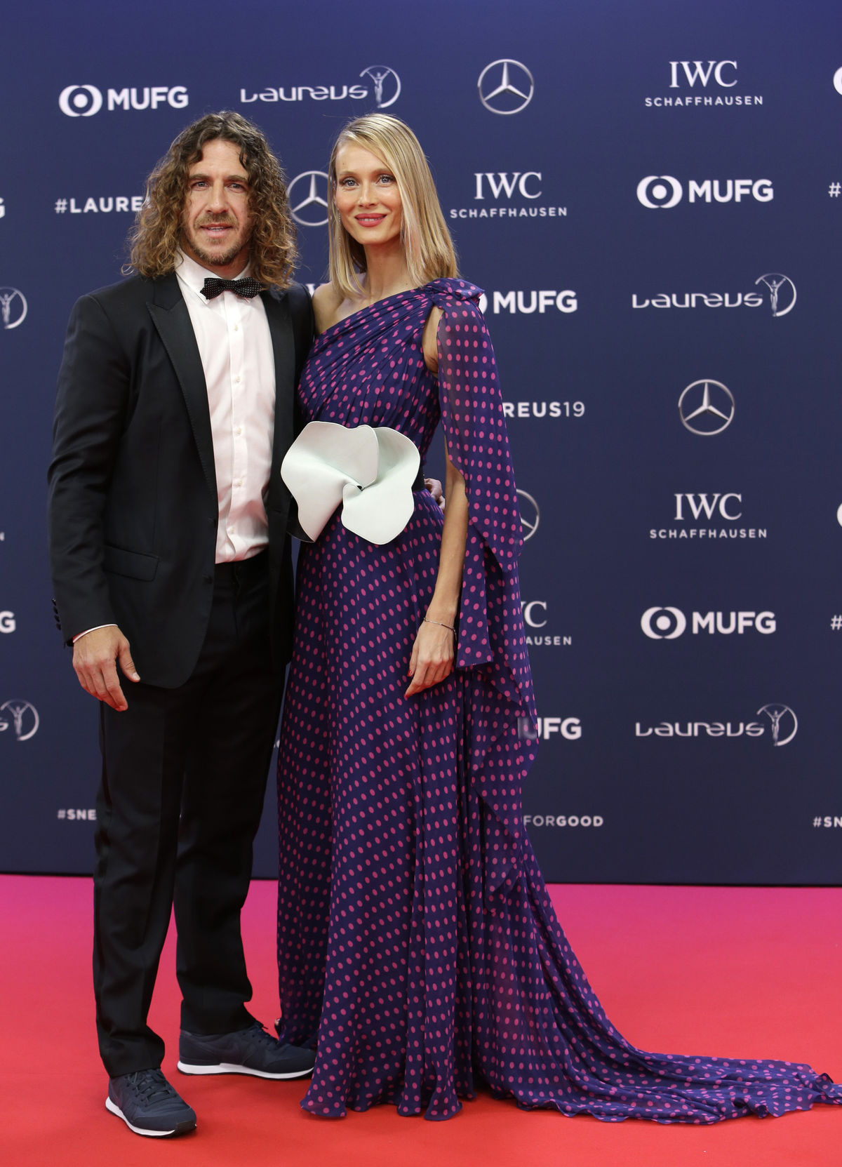 Bývalý kapitán FC Barcelona Carles Puyol a jeho...