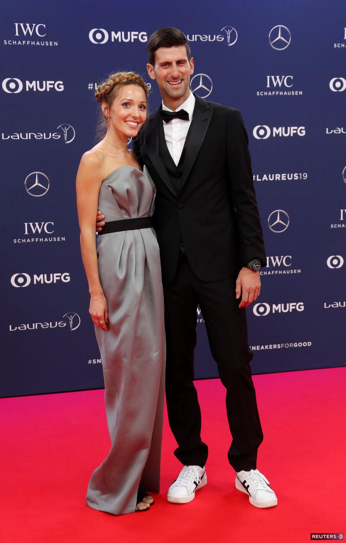 Tenista Novak Djokovič a jeho manželka Jelena...