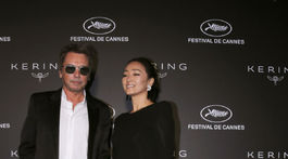 Herečka Gong Li a jej partner, skladateľ Jean-Michel Jarre.