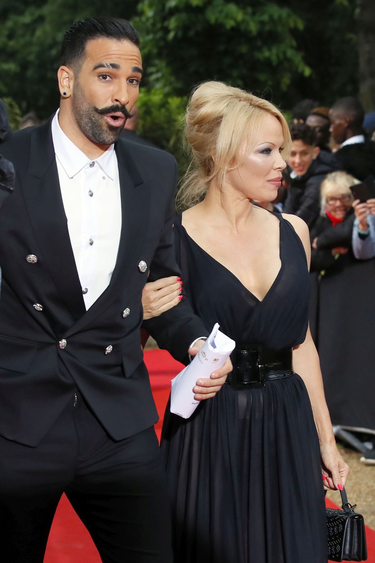 Adil Rami a Pamela Andersonová v máji 2019.