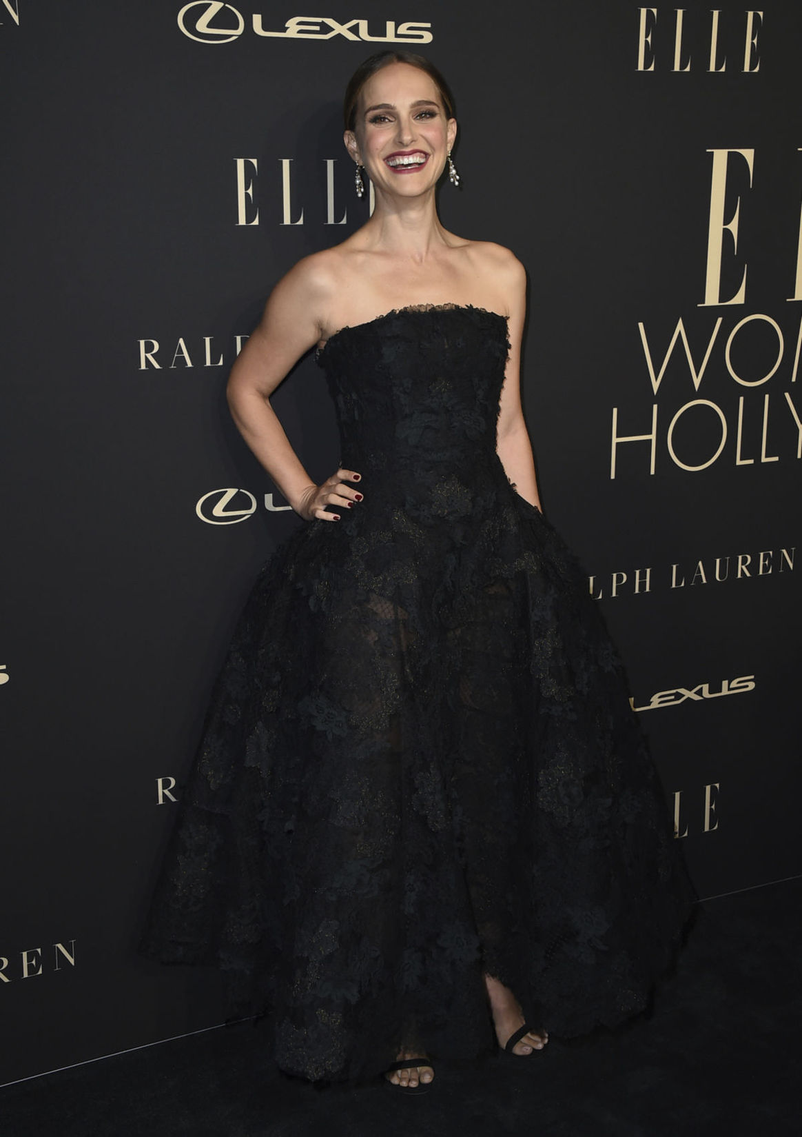 Herečka Natalie Portman v šatách Christian Dior...