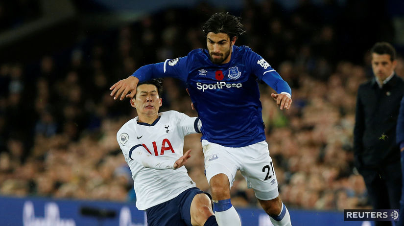 Zákrok Sona Heung-mina na Andrého Gomesa.