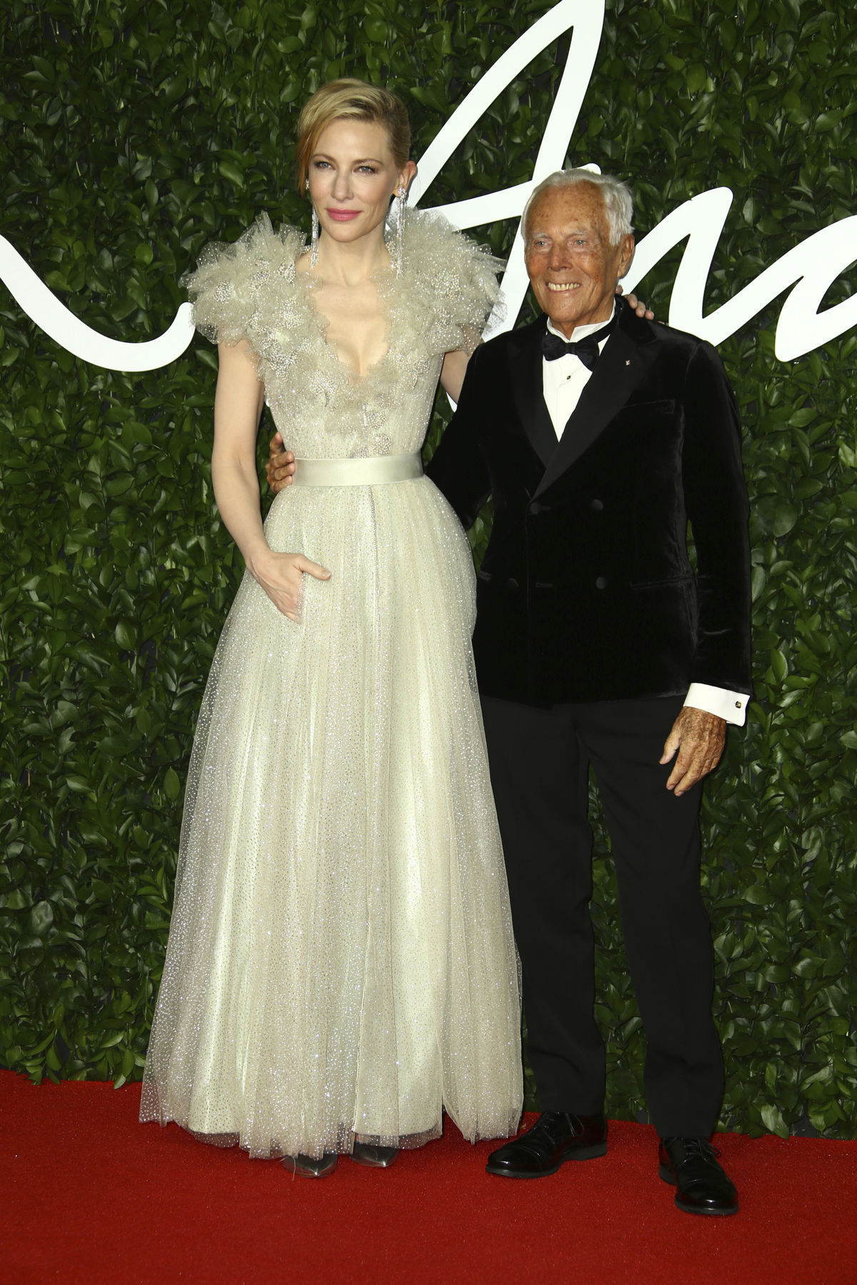 Dizajnér Giorgio Armani a jeho dlhoročná múza -...