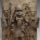 PLAQUE WARRIOR AND ATTENDANTS, 16th-17th c., Nigeria, Africa, Court of Benin, sculpture, cast brass. This work hung on the exterior of the royal palace in Benin City. In center is a warrior chief, fla