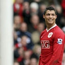 Cristiano Ronaldo smiles during his team's 4-1 win over Bolton Wanderers in their English Premier