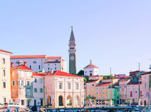 Piran. 09.08.2020. Scenic view of the town of Piran with the main square of Tartini, old colorful buildings with red roofs and the Adriatic Sea with yachts in the coast of Slovenia. Travel concept