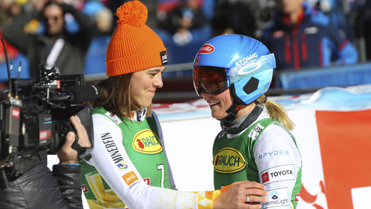 Petra Vlhová congratulates Mikael Shiffrin.