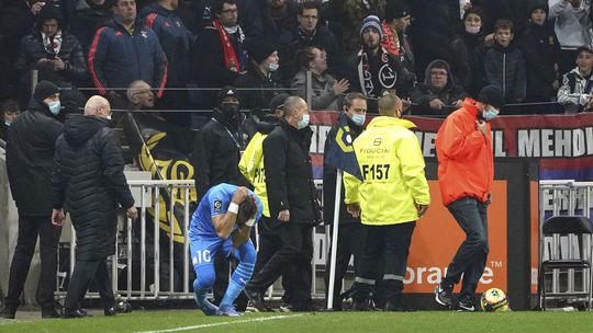   Dimitri Payet from Marseille falls on the lawn after ...