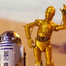 MAY 13 2020: Recreation of a scene from Star Wars A New Hope depicting droids C-3PO and R2D2 on the desert planet of Tatooine with escape pod - Hasbro action Figure