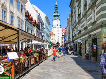 BRATISLAVA, SLOVAKIA - SEPTEMBER 23, 2015: tourists walk on Michalska street in Bratislava. In Middle Ages this street was part of a busy trade route linking the Baltic Sea with the Danube
