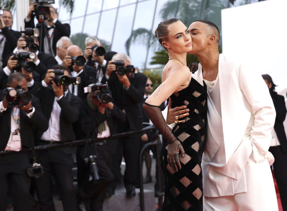 Herečka a modelka Cara Delevingne a dizajnér...